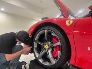 Red Ferrari with PPF Installed